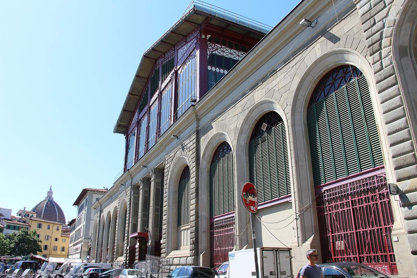 The iron-and-glass Mercato Centrale with the Duomo's dome beyond