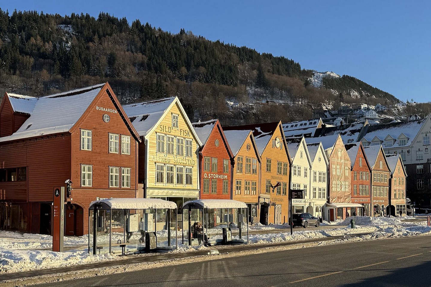 Snow-dusted wooden houses of Bryggen in Bergen