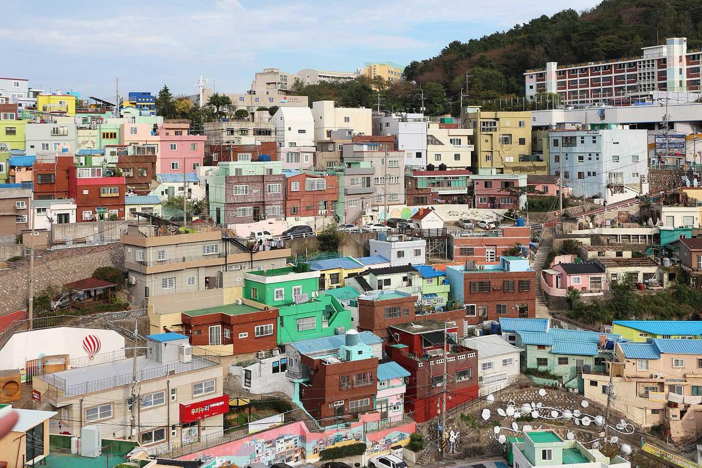 Pastel houses climbing the hillside of Gamcheon Culture Village in Busan
