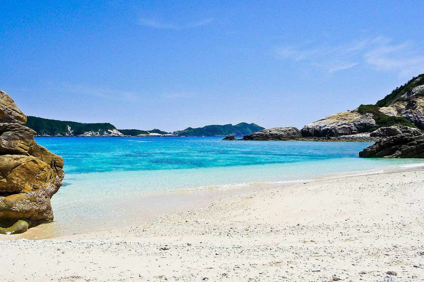 White sand and turquoise water on a beach in the Kerama Islands, Okinawa
