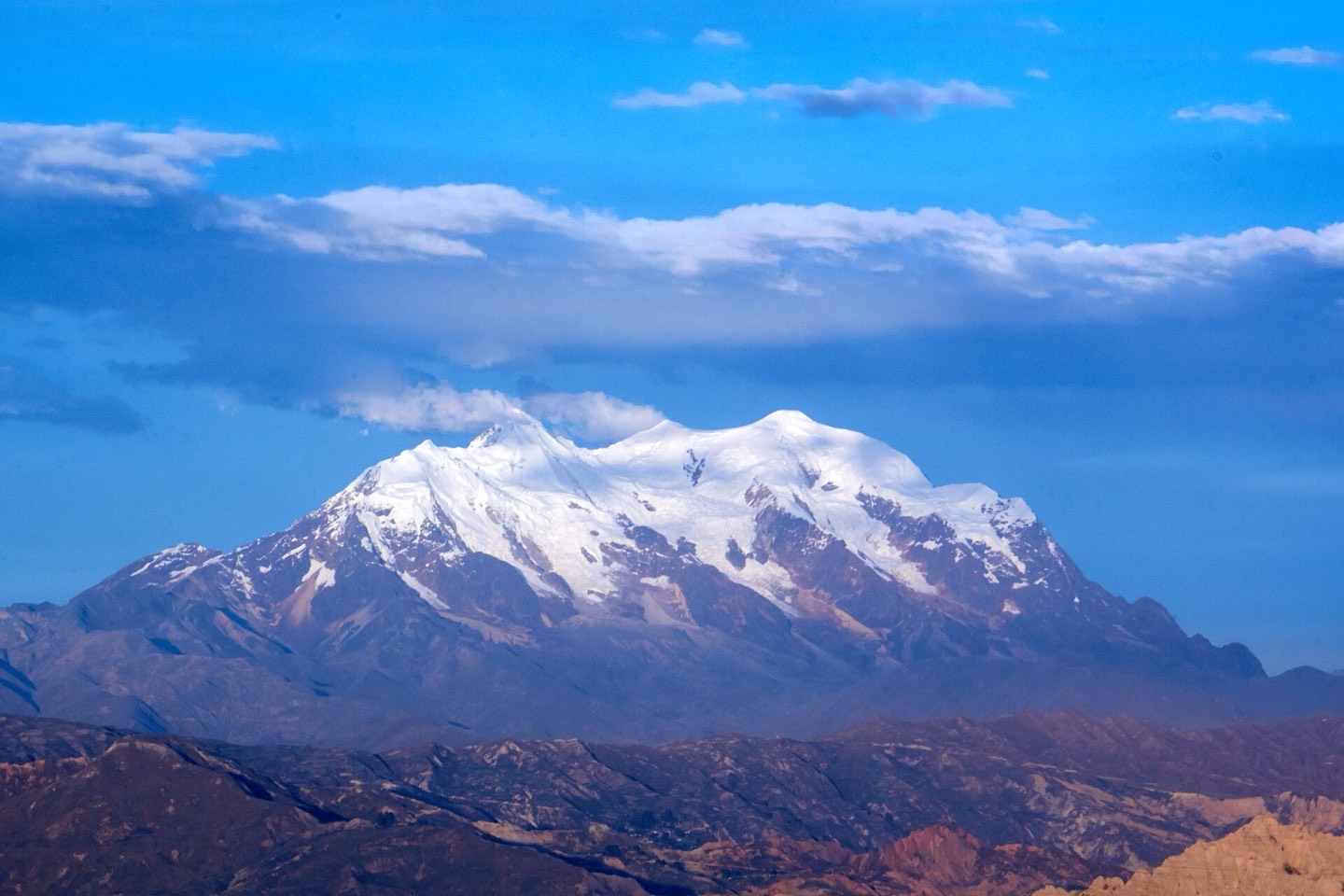 La Paz spread across its canyon with Illimani behind