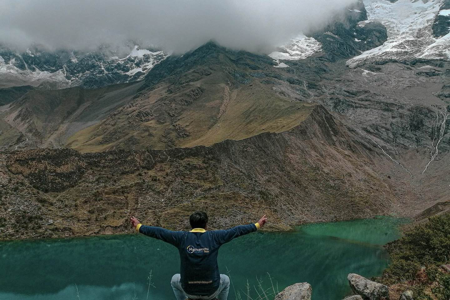 Turquoise Humantay lake under a glacier