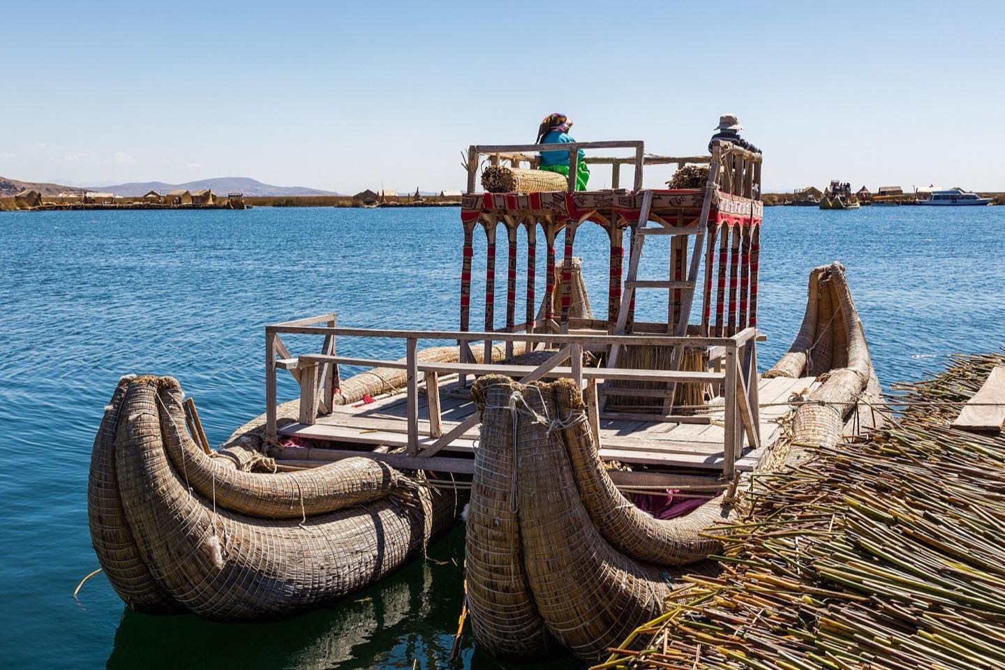 Reed houses and boats on the Uros floating islands