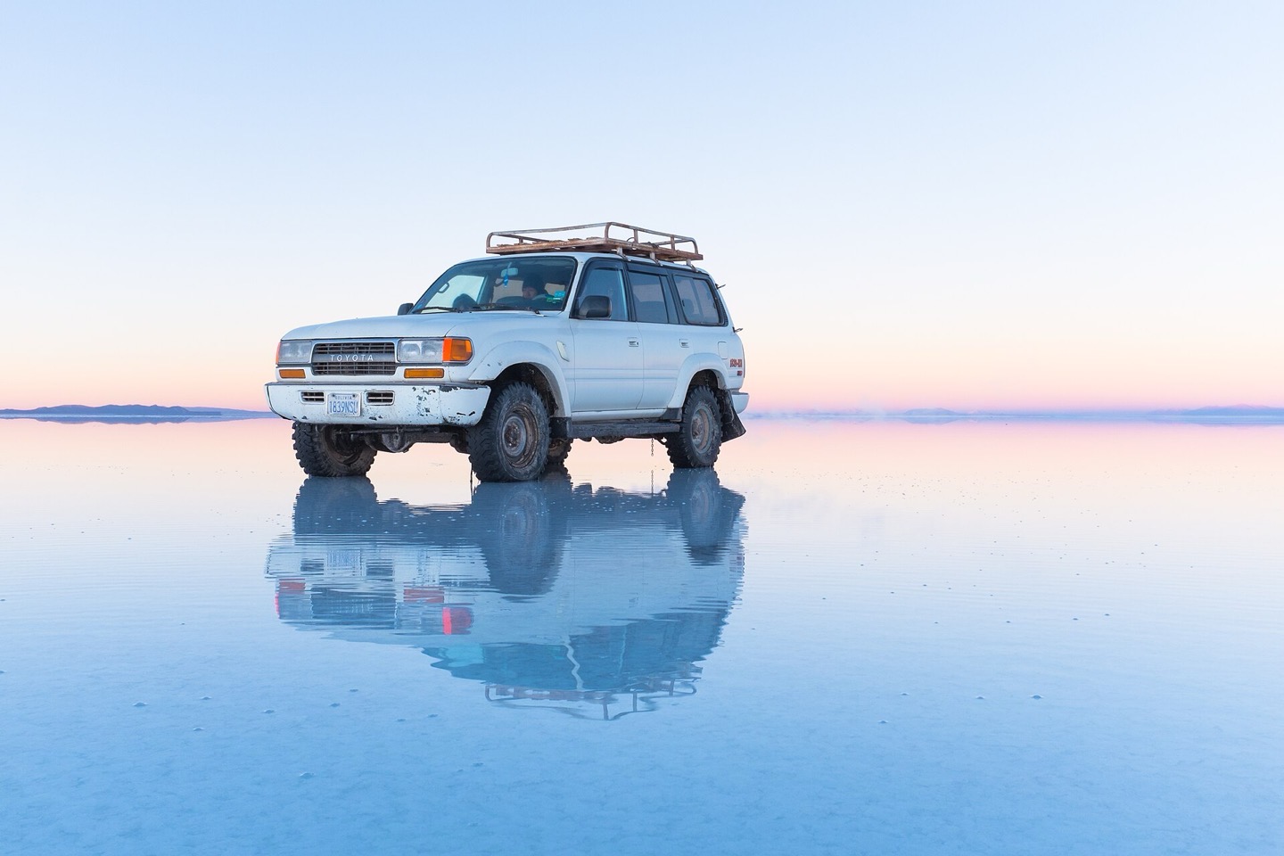 Mirror reflections on the flooded Salar de Uyuni